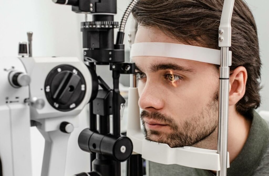 A man undergoing an eye exam before a laser eye surgery