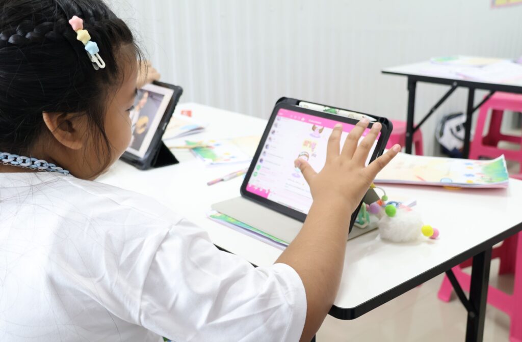 A child having up-close screen time on their ipad